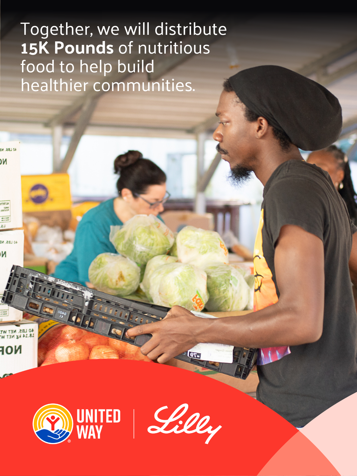 Volunteers distribute fresh food.