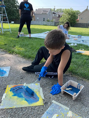 Born Learning Trail Young boy painting