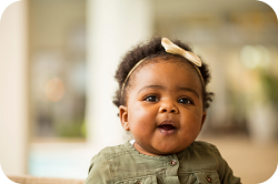 Baby Girl Smiling - No Small Matter 